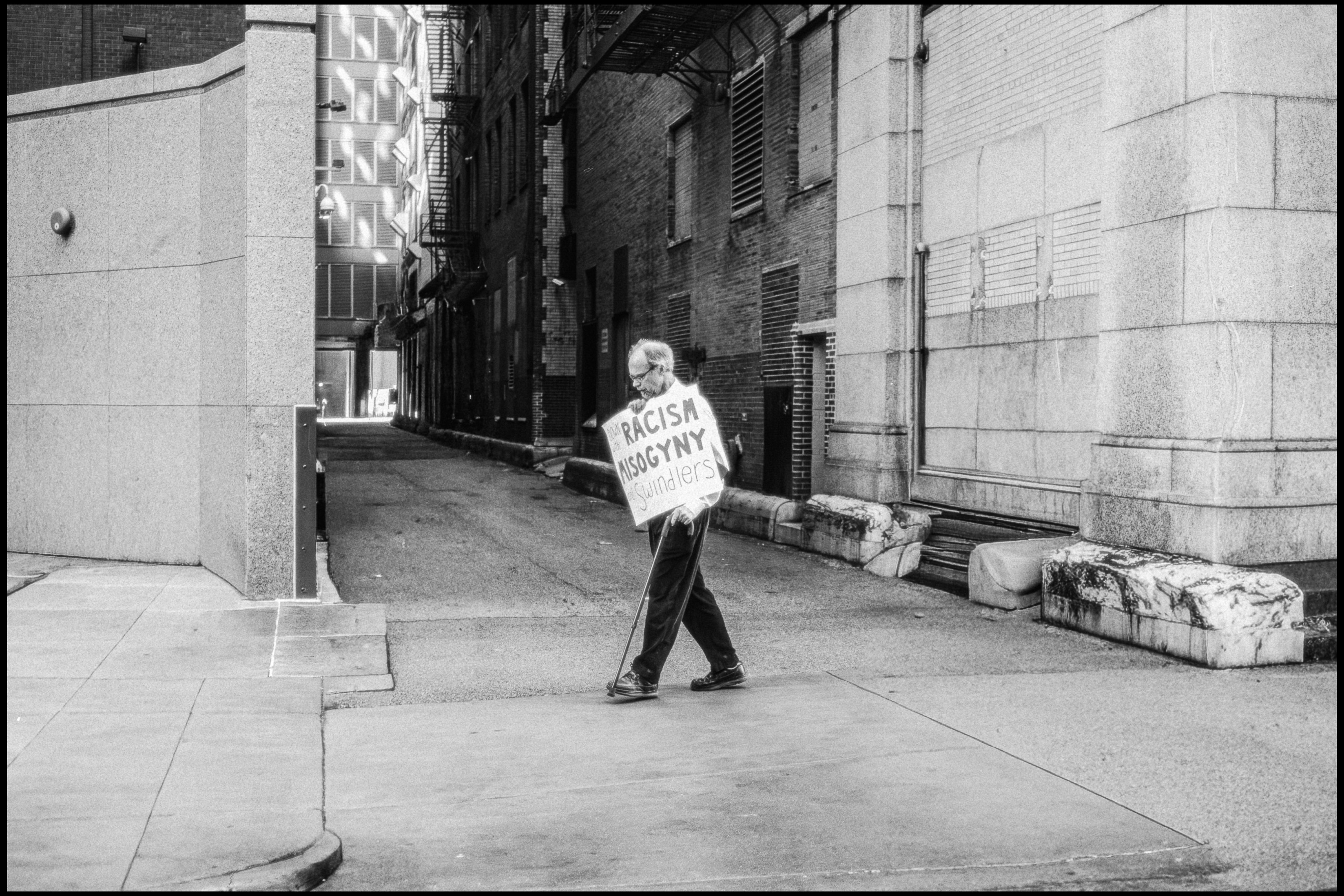Down with misogyny and swindlers sign, Chicago 2017