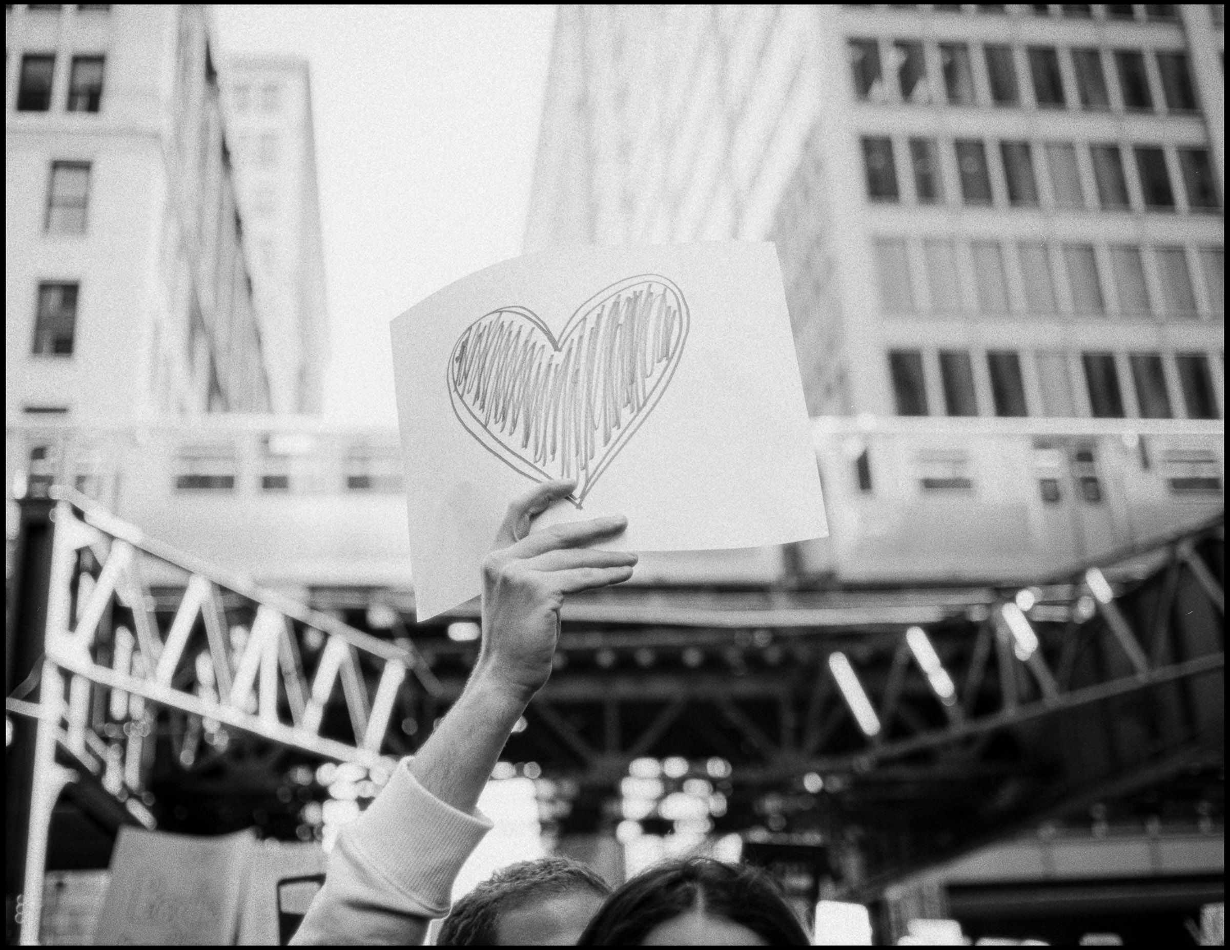 Heart sign in the march crowd, Chicago 2017