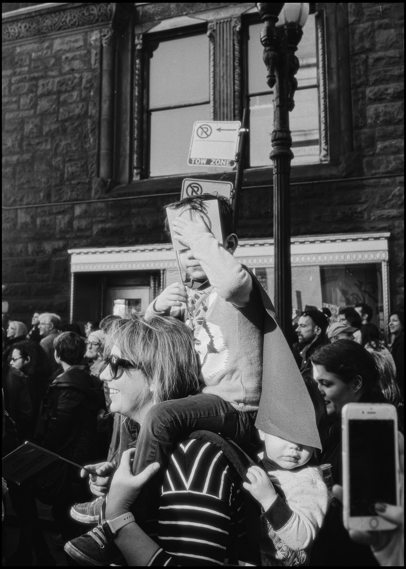 Kid in a cape at the Women's March, Chicago 2017