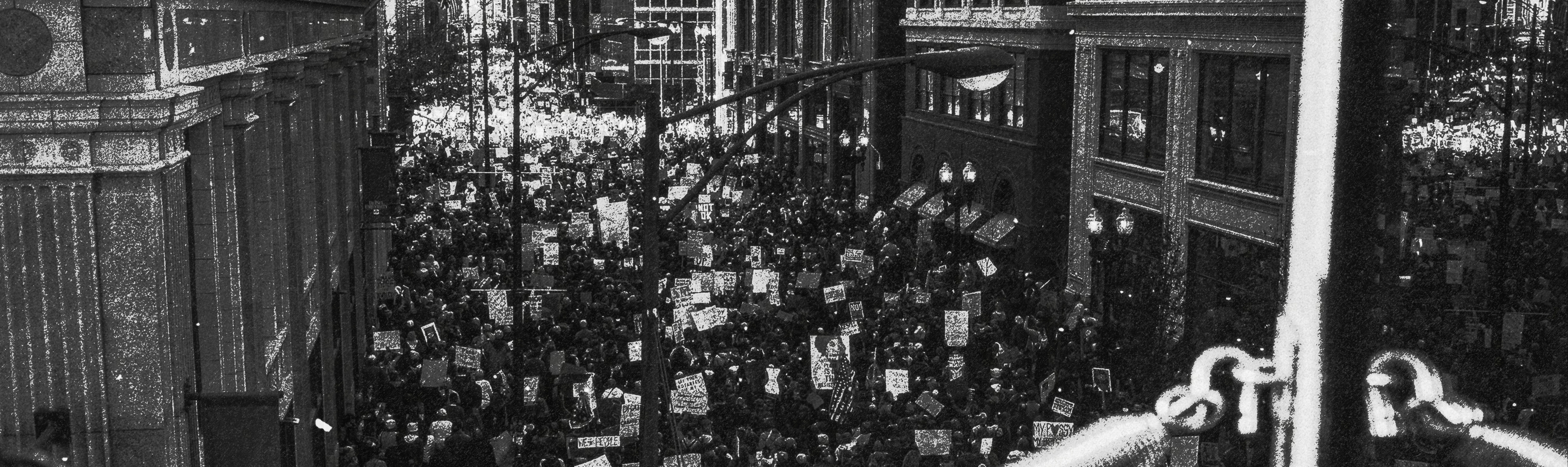 FIRST DAY — Women's March, Chicago, January 21, 2017. A quarter million people fill Jackson Boulevard, photographed from the CTA Green Line gangway.